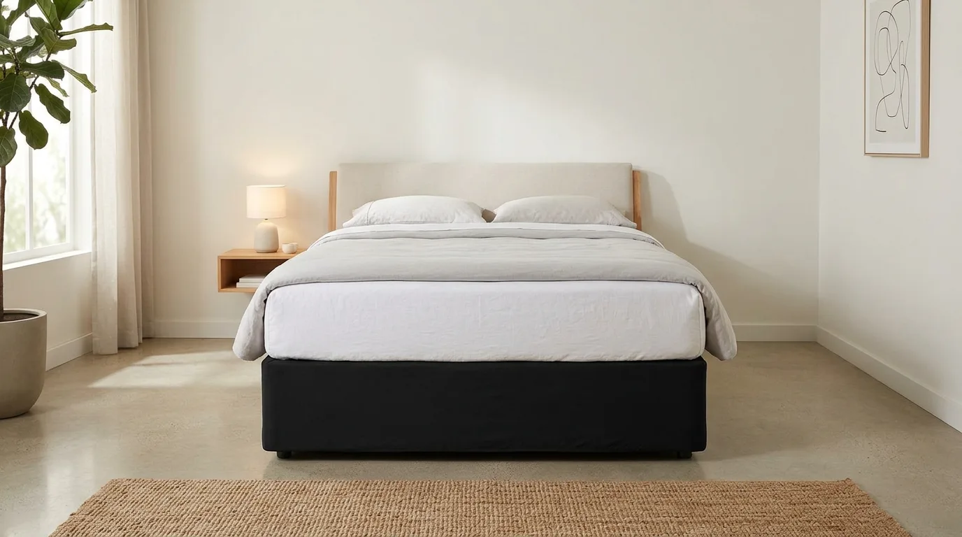A striped DIY box spring cover that coordinates with the bedding palette, no people
